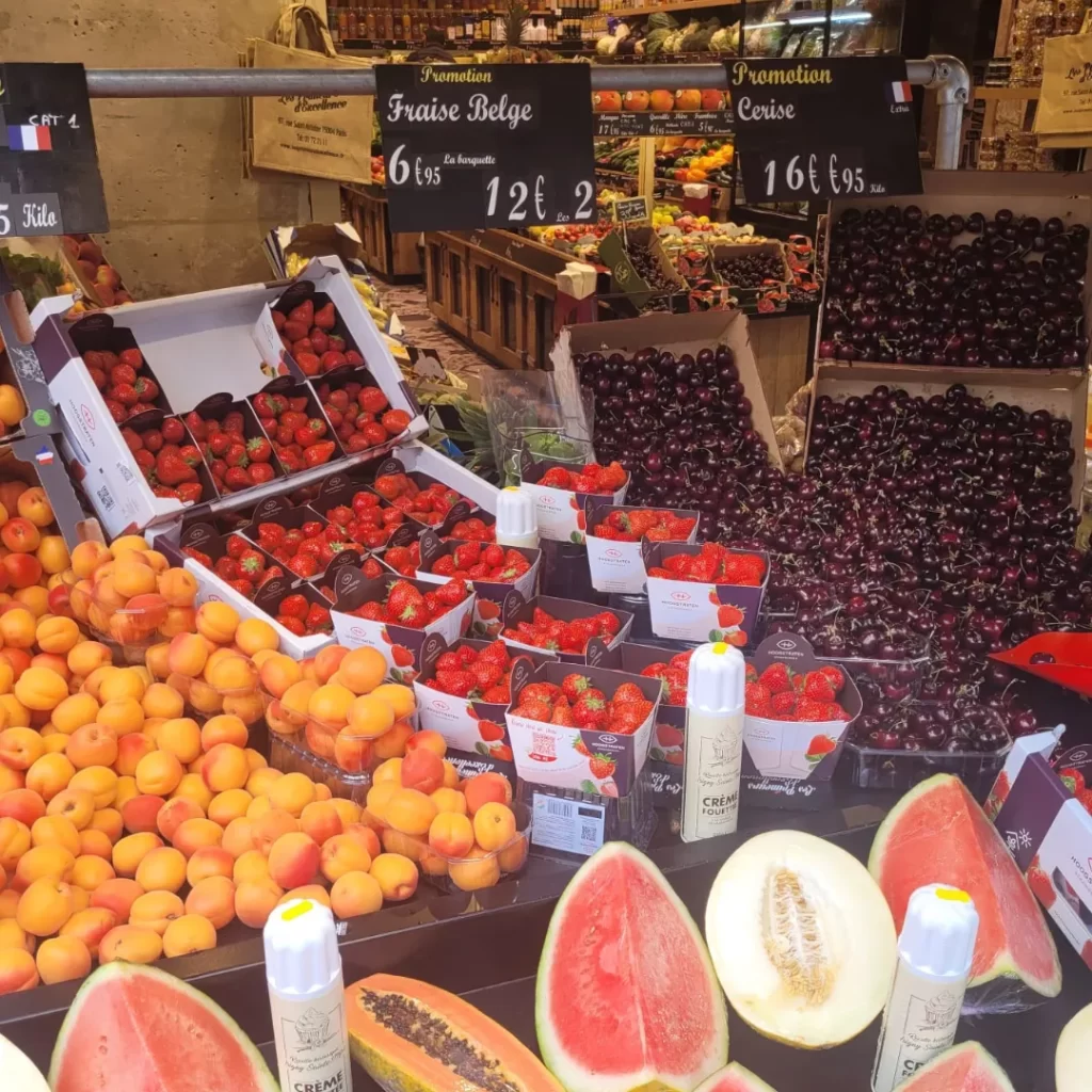 Large quantities of fruit on a market stall in Paris