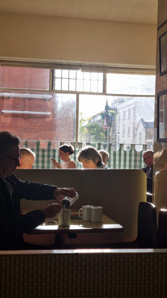 Gingham curtains at retro cafe in Pimlico, London