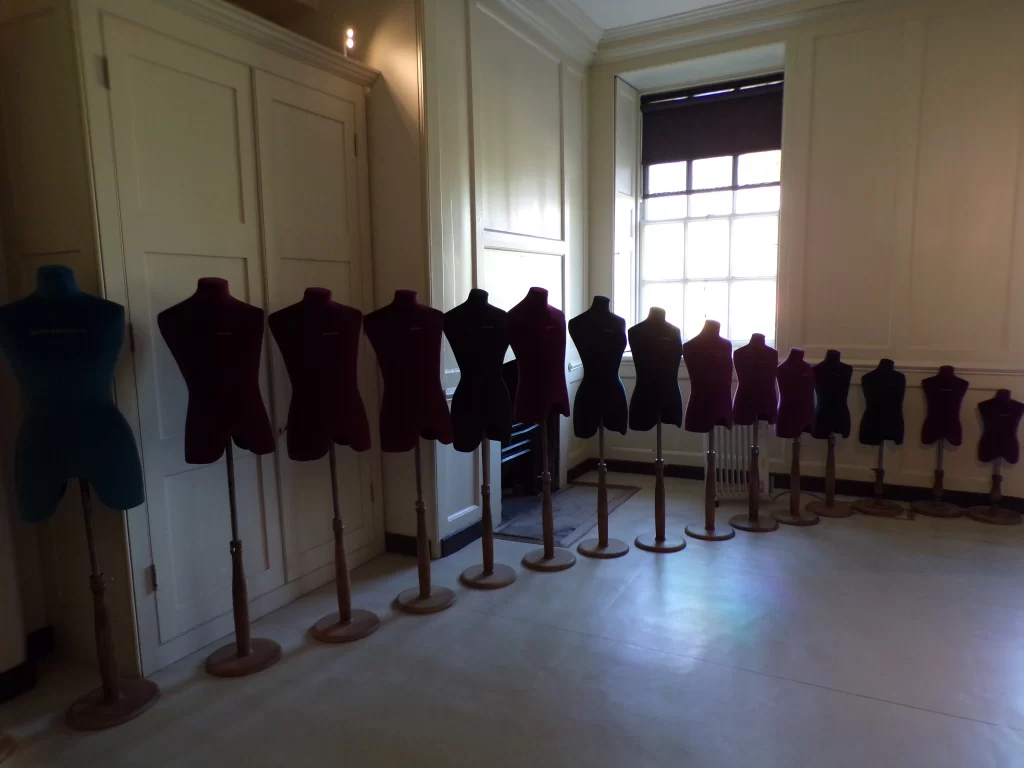 Collection of mannequins with names of King George, Queen Charlotte and their children at Kew Palace